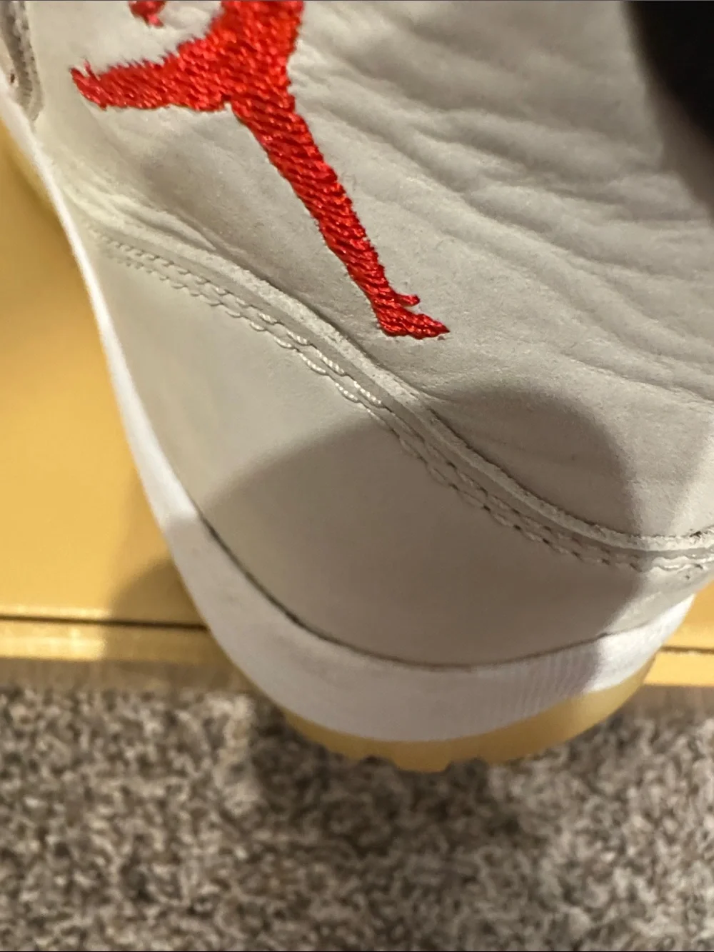 Jordan 11 Men's High-Top Sneakers in Off-White, Gum & Red Accents